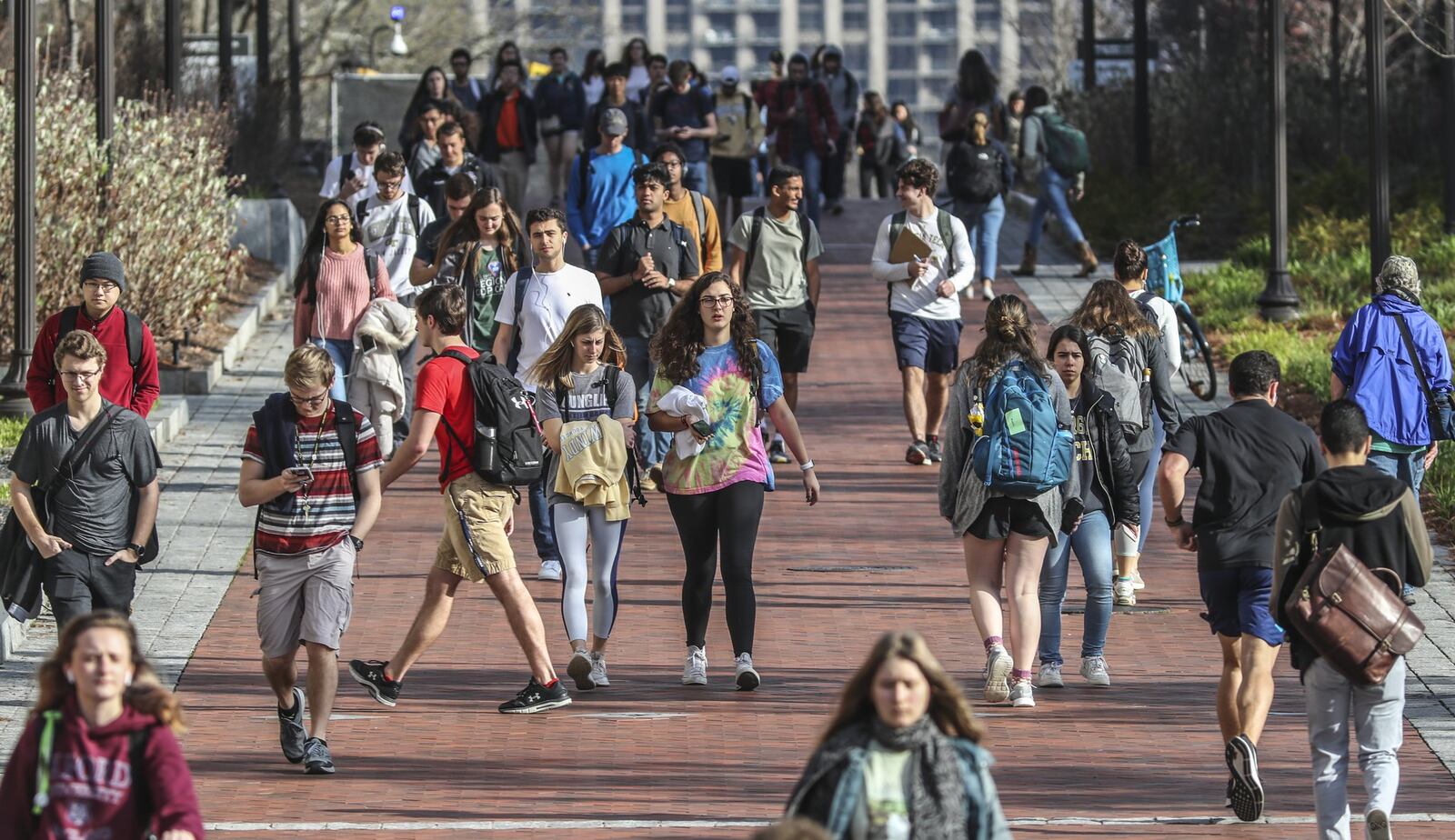 Georgia Tech students were on the move in between classes on campus on Wednesday, March 11, 2020. Georgia Tech, like other state colleges and universities, has closed campuses due to the coronavirus outbreak and is offering online counseling services for students needing assistance. 