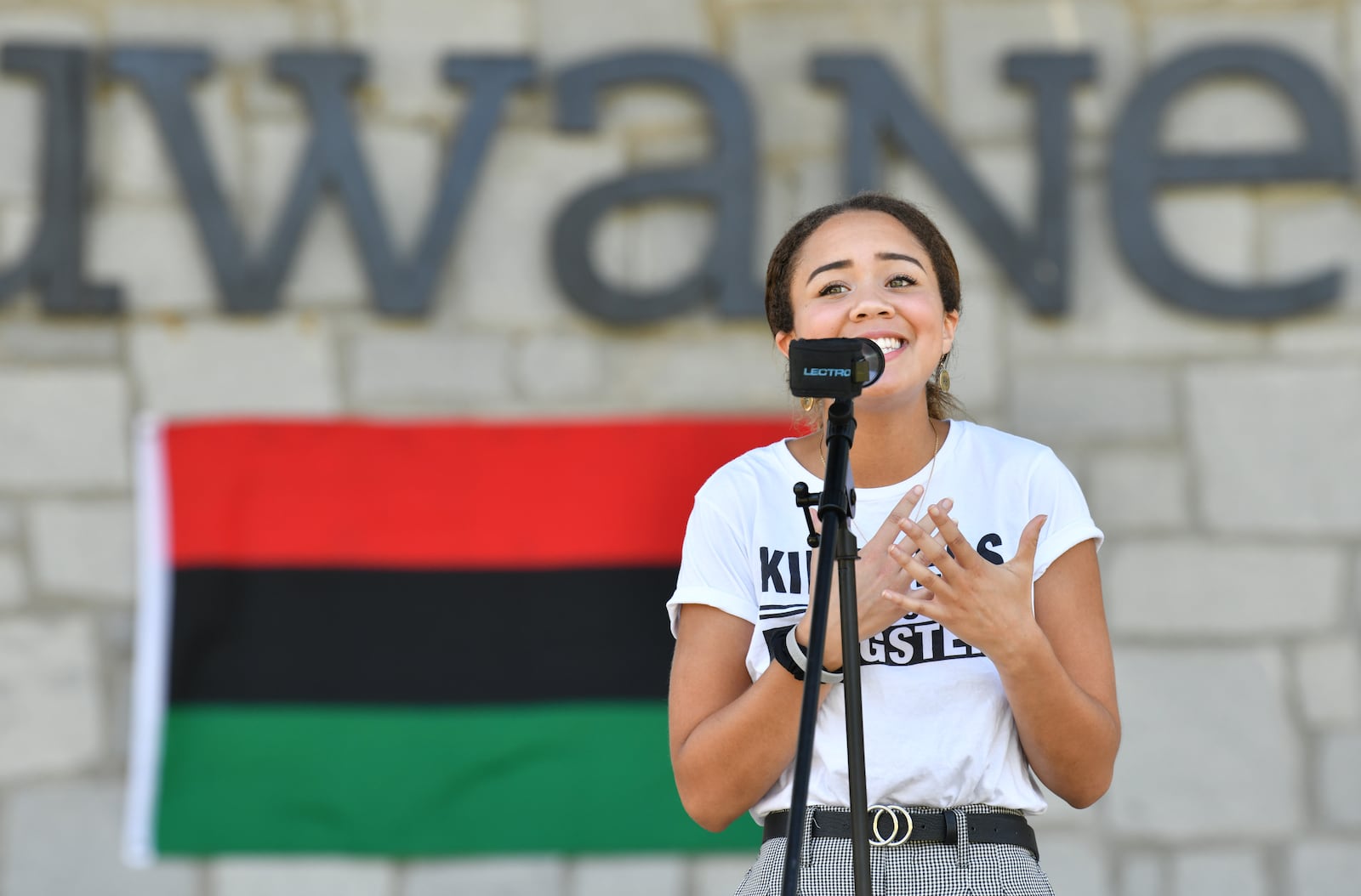 July 11, 2020 Suwanee - Valyn Turner performs during Gwinnett Citizens for Equity and Justice event, a rally and information session organized by Gwinnett Educators for Equity & Justice, at Town Center Park in Suwanee on Saturday, July 11, 2020. They are explaining their stance on forcing Gwinnett schools to include implicit bias training for educators, include cultural and racial history and education in curriculum and hire more teachers of color.  (Hyosub Shin / Hyosub.Shin@ajc.com)