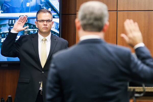 Suspended Court of Appeals Judge Christian Coomer takes the stand on day one of his trial for alleged ethic violations in October. (Natrice Miller/natrice.miller@ajc.com)  


