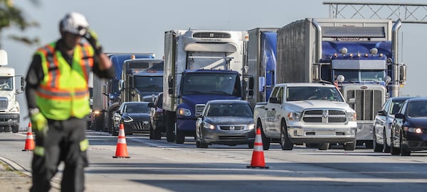 All southbound lanes of I-285 were closed at Langford Parkway for nearly two hours Wednesday morning while Atlanta fire crews worked to extinguish a burning tractor-trailer filled with dog food.