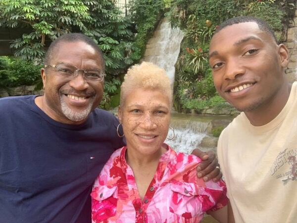 Kaaryn Walker (center), with her father Bobby Burton and her son, Jordan Walker. Burton was shot three times in the back during the Orangeburg Massacre.