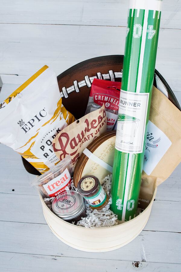 Take home  Star Provisions' Pigskin Basket, full of snacks and decor for your own watch party.