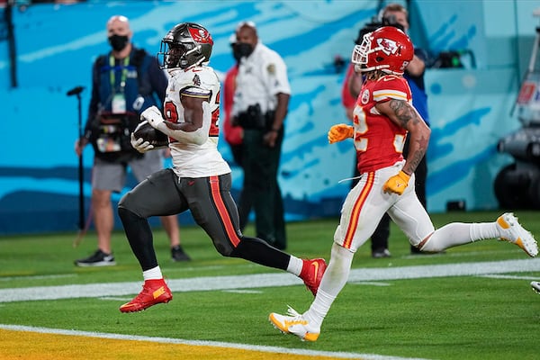 Tampa Bay Buccaneers running back Leonard Fournette reached the end zone on a 27-yard touchdown against the Kansas City Chiefs during the second half of Super Bowl 55 Sunday, Feb. 7, 2021, in Tampa, Fla. (David J. Phillip/AP)