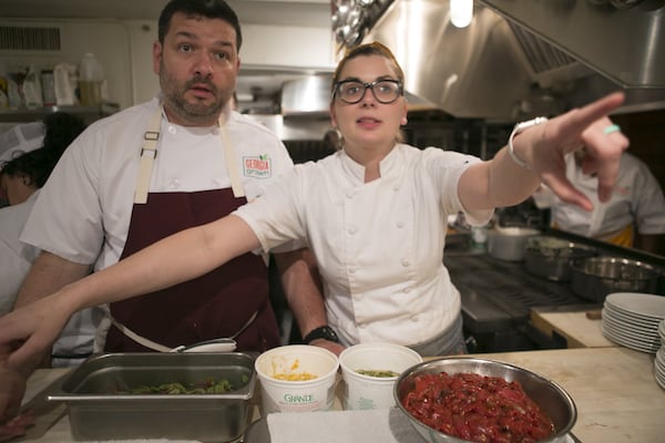 Savannah Sasser (left) works with chef Julio Delgado during the June 7 Georgia Grown dinner at the James Beard House in New York City. “I bring Savannah every year because she’s super organized,” said Georgia Grown chef Holly Chute. “It’s a flawless execution having her there. She knows the routine and what needs to be done.” LIGAYA FIGUERAS / LFIGUERAS@AJC.COM