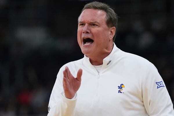 Kansas head coach Bill Self calls to his players during the first half in the first round of the NCAA college basketball tournament, Thursday, March 20, 2025, in Providence, R.I. (AP Photo/Charles Krupa)