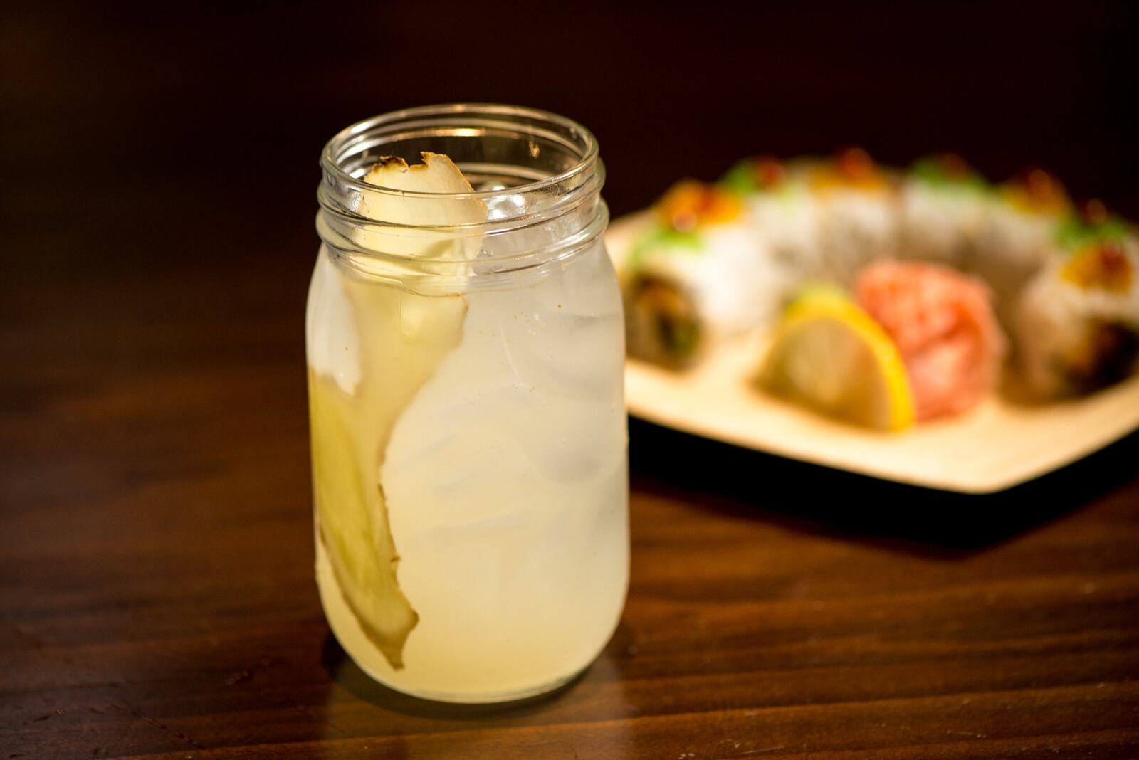 Yuzu Gari cocktail with Kinjo Shiro, yuzu, sweet pickled ginger, and seltzer. Photo credit- Mia Yakel.