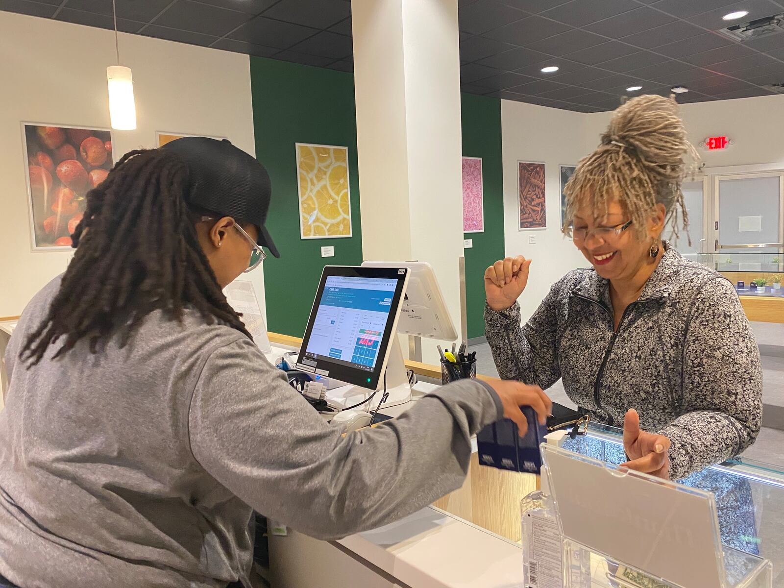 In this file photo, Sylvia Hayes, 60, started her quest to get certified and get a low-THC card late last year, wanting to have it ready once the medical dispensaries opened up in April of last year.  (Helena Oliviero helena.oliviero@ajc.com)