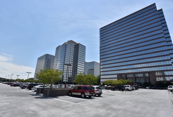 The Galleria Office Park, which has about 6,000 private parking spaces, will not be allowed to sell that parking to Braves fans on game days because of an ordinance passed by the Cobb County commission in February. HYOSUB SHIN / HSHIN@AJC.COM