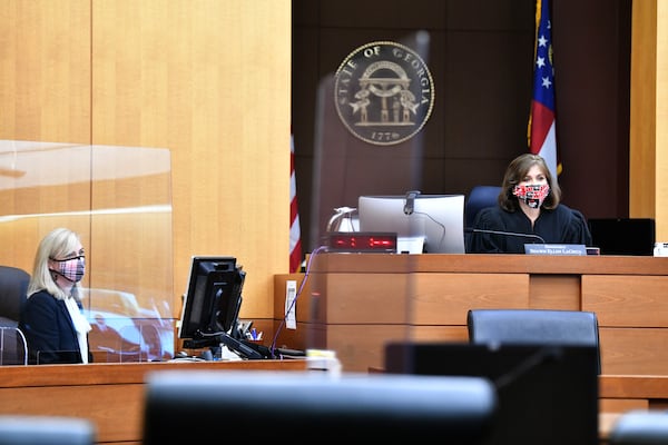 Superior Court Judge Shawn Lagrua speaks as she presides a case in the courtroom  where plexiglass dividers are installed at Fulton County Courthouse in Atlanta on Tuesday, Oct. 27, 2020. (Hyosub Shin / Hyosub.Shin@ajc.com)