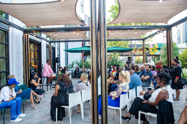 Fulton County officials, organizers and media gather at One Flew South on the Beltline on Thursday, Aug 31 to introduce fashion designers in the FACES of Fashion Art and Fashion Gala that will take place on Sept 16.  The collaboration is working to make Atlanta part of the national and international fashion scene.  (Jenni Girtman for The Atlanta Journal-Constitution)