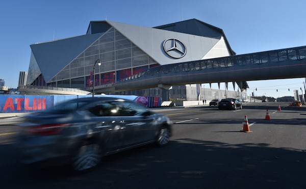 January 29, 2019 Atlanta - Picture shows Northside Drive pedestrian bridge outside Mercedes-Benz Stadium on Tuesday, January 29, 2019. In March, the Atlanta City Council grudgingly approved an additional $10 million to complete the Northside Drive pedestrian bridge in time for Super Bowl 53. They were told that the project's total cost would not exceed $23.2 million and that it was needed to connect residents in the Vine City community to downtown and the stadium. It turns out that the bridge is closed to the public for the big game and that the city actually spent more than $27 million on the project. HYOSUB SHIN / HSHIN@AJC.COM