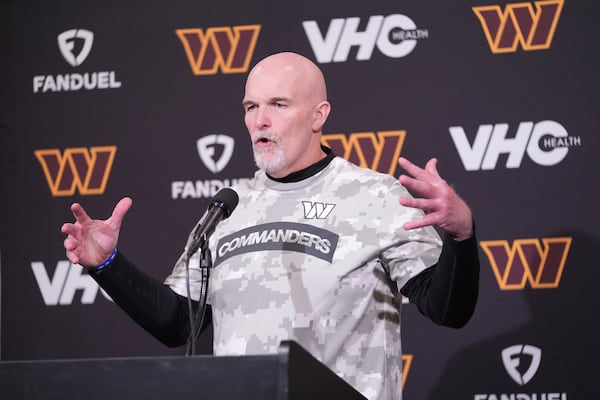 Washington Commanders head coach Dan Quinn speaks during a news conference following an NFL football game against the Philadelphia Eagles Thursday, Nov. 14, 2024, in Philadelphia. (AP Photo/Chris Szagola)