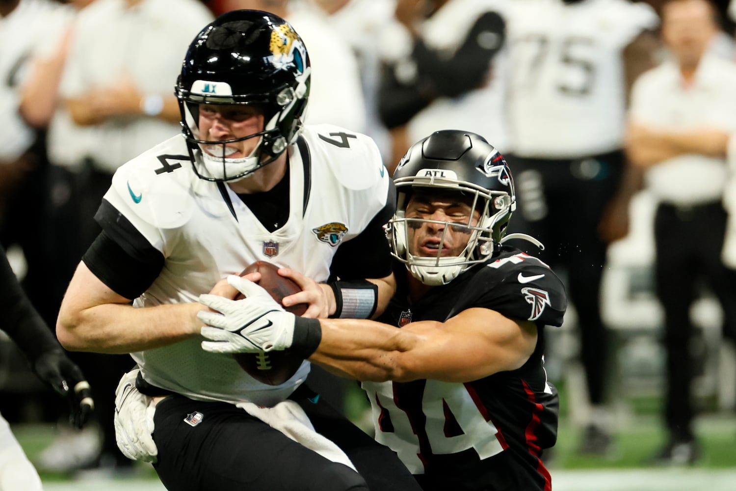 Atlanta Falcons' linebacker Troy Andersen (44) forces Jacksonville Jaguars' quarterback E.J. Perry (4) to move out of the pocket during the fourth quarter of an NFL exhibition game against the Jacksonville, Jaguars on Saturday, August 27, 2022, at the Mercedes-Benz Stadium in Atlanta, Ga.
 Miguel Martinez / miguel.martinezjimenez@ajc.com