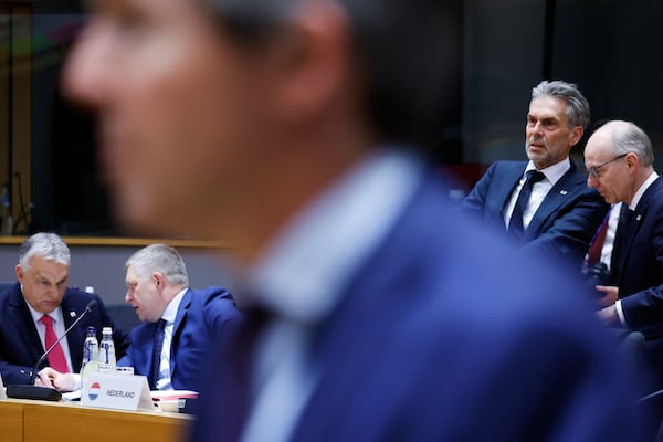 Hungary's Prime Minister Viktor Orban, left, speaks with Slovakia's Prime Minister Robert Fico, second left, as Luxembourg's Prime Minister Luc Frieden, right, speaks with Netherland's Prime Minister Dick Schoof, second right, during a round table meeting at an EU summit in Brussels, Thursday, March 20, 2025. (AP Photo/Omar Havana)