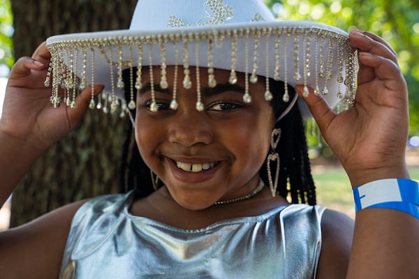 Zariah, also known as Royal Z, poses for a picture before her dance performance at the Pure Heat Community Festival in Piedmont Park on Sunday, Sept. 1, 2024.  (Olivia Bowdoin for the AJC).