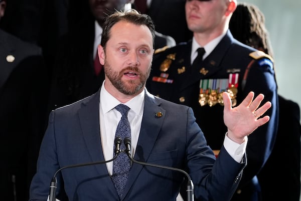 Jason Carter, grandson of former President Jimmy Carter, said he didn't mind that flags were raised to full staff for the presidential inauguration of Donald Trump. 