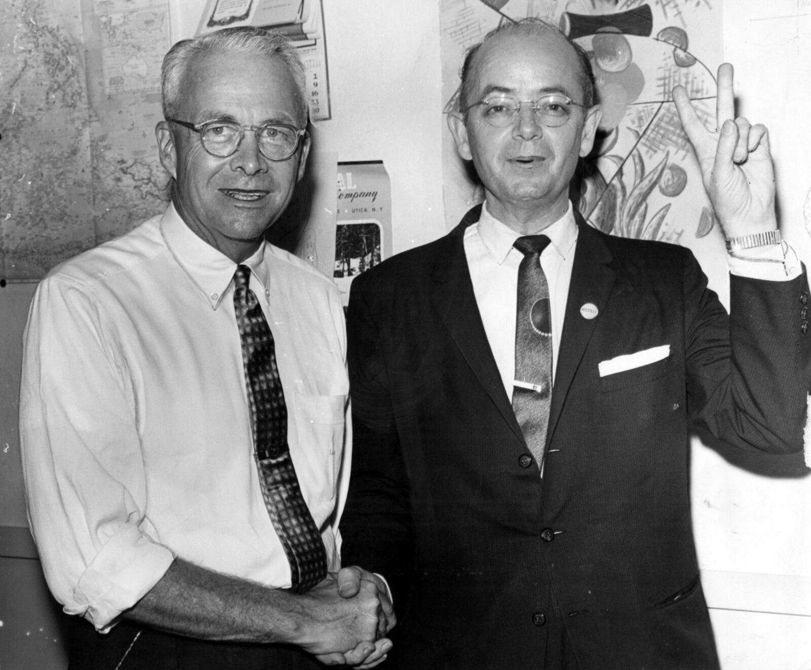 Atlanta Mayor Ivan Allen, Jr., left, shakes hands with Gov. Lester Maddox, but the two often were at odds with each other. (Billy Downs/AJC staff)