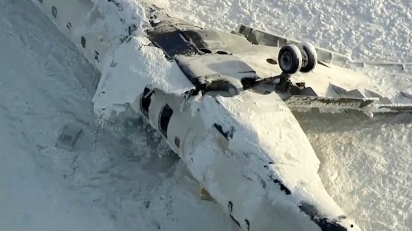 This image taken from video provided by CTV shows an aerial view of the overturned plane at the Toronto Pearson International Airport on Tuesday, Feb. 18, 2025. (CTV via AP)