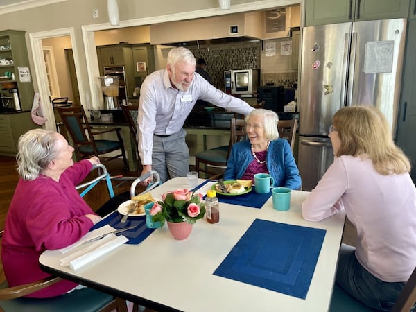 Park Springs Senior Living residents Martha Albertson, 93, left, and Geraldine Taylor, 90, second from right, converse with Taylor’s daughter, Colleen Bittinger in a Park Springs kitchen area. With them is Tim Knight, executive director of training and organizational development for Isakson Living. Isakson’s community household model of care for residents receiving health care services utilizes these areas to bring residents together for meals and socialization with each other and family.