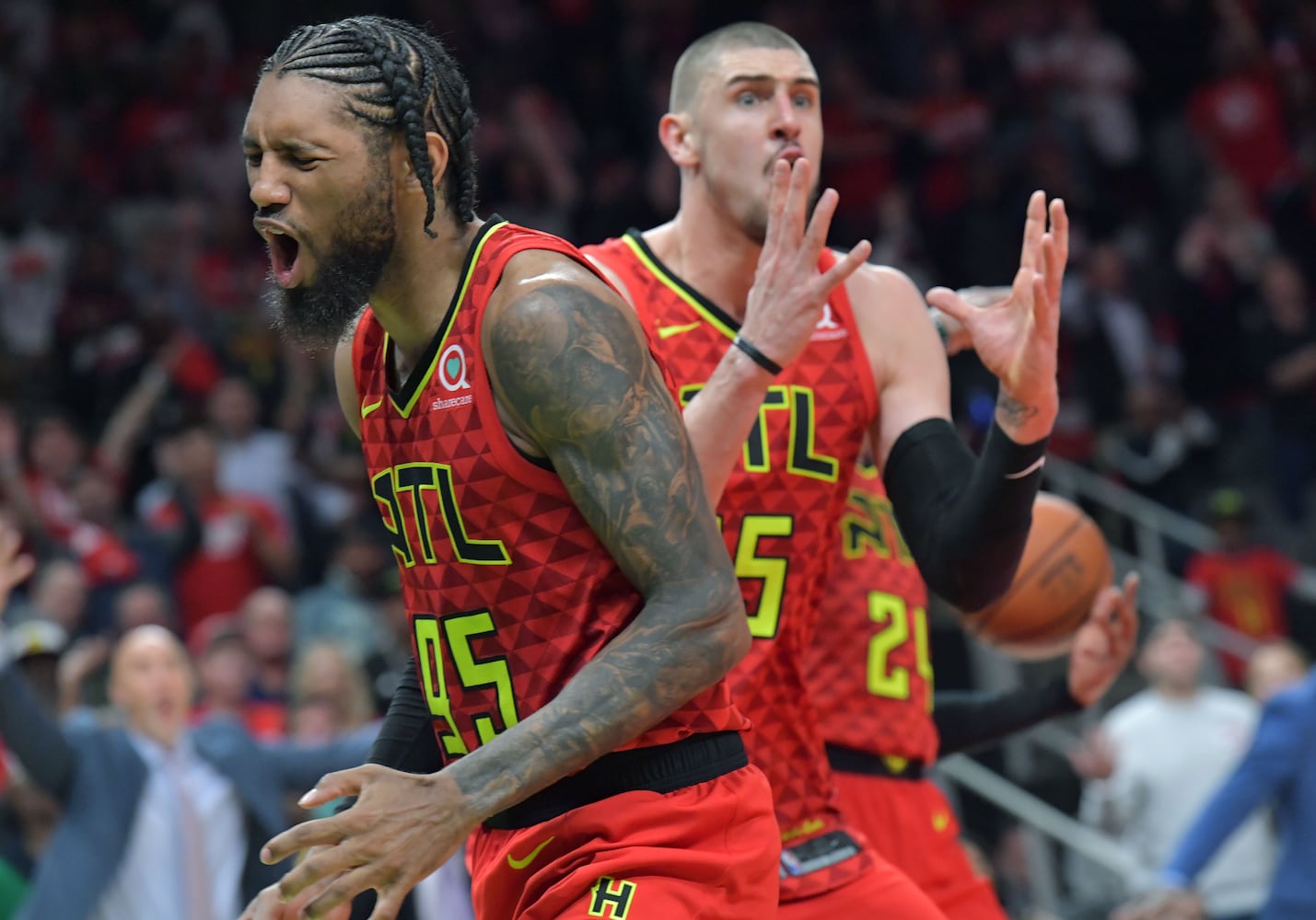 Photos: Hawks rally to beat Mavs in home opener