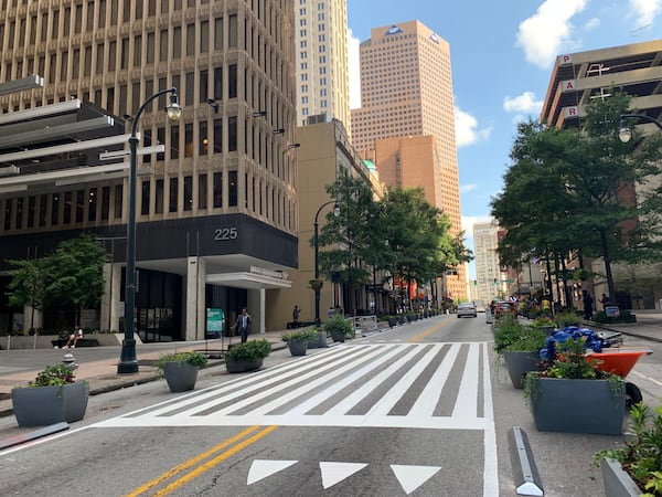 225 Peachtree Street crosswalk as it looked 2021, during a pilot project aimed at narrowing the street to make it safer for pedestrians to cross.