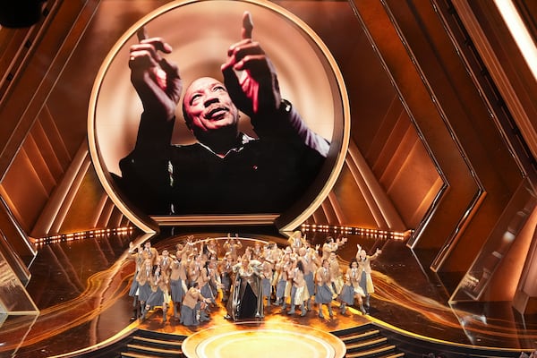 Queen Latifah, center, performs "Ease on Down the Road" during the Oscars on Sunday, March 2, 2025, at the Dolby Theatre in Los Angeles. (AP Photo/Chris Pizzello)