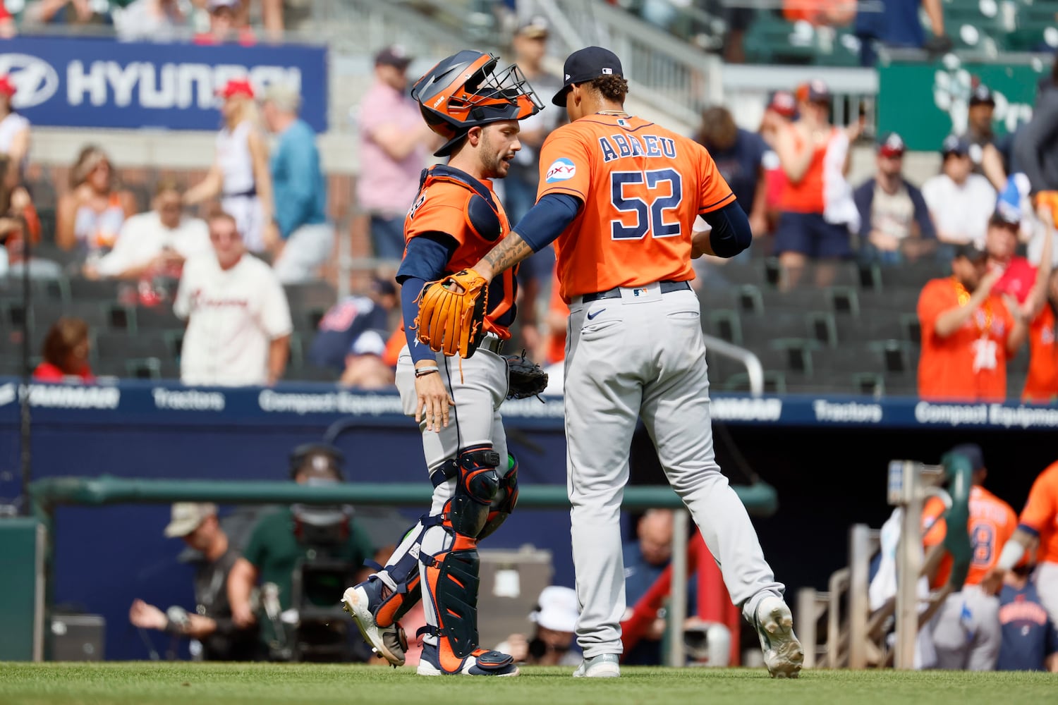 Astros relief pitcher Bryan Abreu (52) celebrates with catcher Martin Maldonado their win 5-2 against the  Braves at Truist park on Sunday, April 23, 2023. 
Miguel Martinez / miguel.martinezjimenez@ajc.com 