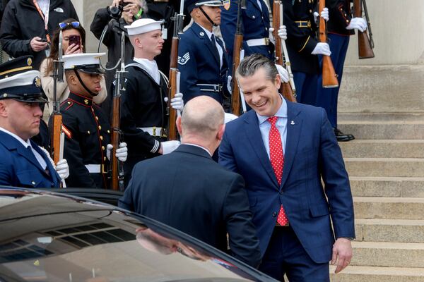 Secretary of Defense Pete Hegseth, right, welcomes Britain's Defense Secretary John Healey, left, to the Pentagon, Thursday, March 6, 2025, in Washington. (AP Photo/Rod Lamkey, Jr.)