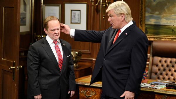 In this photo provided by NBC, Melissa McCarthy as White House Press Secretary Sean Spicer, left, and Alec Baldwin as President Donald Trump perform during "Spicer Returns" on the television show "Saturday Night Live," Saturday, May 13, 2017, in New York.  (Will Heath/NBC via AP)