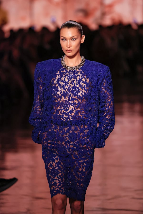 Bella Hadid wears a creation as part of the Saint Laurent Fall/Winter 2025-2026 Womenswear collection presented Tuesday, March 11, 2025. in Paris. (AP Photo/Thomas Padilla)