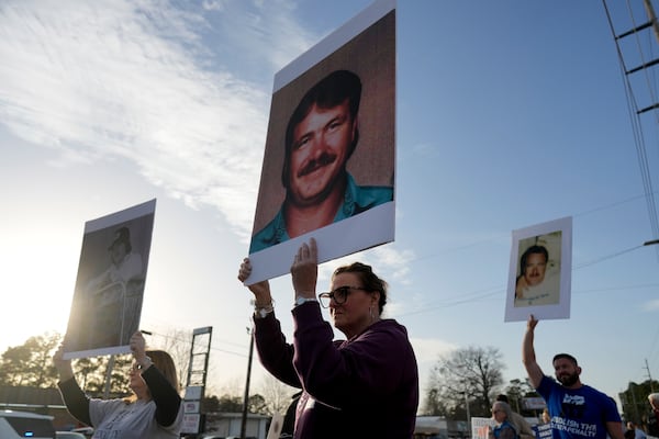 Protestors demonstrate outside the scheduled execution of South Carolina inmate Brad Sigmon, Friday, March 7, 2025, in Columbia, S.C. (AP Photo/Chris Carlson)