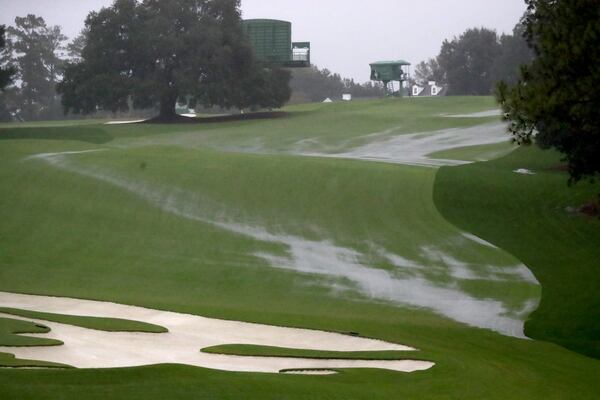 Nov. 12, 2020 - Augusta, Ga. - Water runs down the 10th fairway as play is suspended due to rain during the first round of the Masters Tournament Thursday, Nov. 12, 2020, at Augusta National Golf Club in Augusta, Ga. (Curtis Compton / Curtis.Compton@ajc.com)