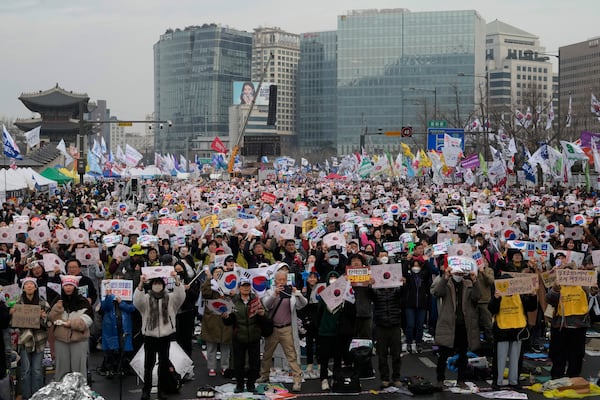 FILE - Protesters stage a rally calling for impeached South Korean President Yoon Suk Yeol to step down in Seoul, South Korea on March 1, 2025. (AP Photo/Ahn Young-joon, File)