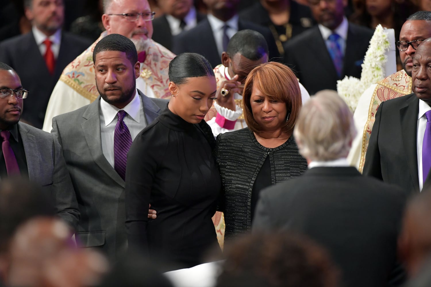 Mourners attend the funeral of Bishop Eddie Long