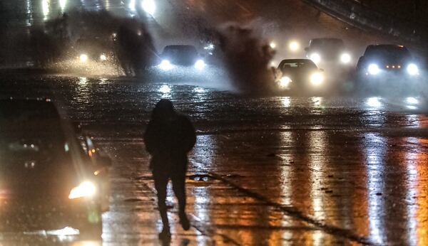 Motorists were stranded on the side of I-20 West before Candler Road after hours of heavy rain Wednesday morning flooded the interstate.