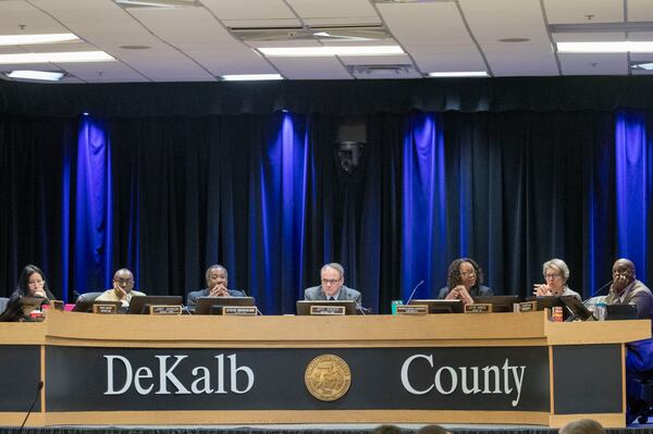 Members of the DeKalb County Board of Commissioners listen as citizens speak during a meeting on March 13, 2018. ALYSSA POINTER/ALYSSA.POINTER@AJC.COM