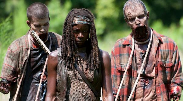 Walkers and Michonne (Danai Gurira) - The Walking Dead _ Season 4, Episode 9 - Photo Credit: Gene Page/AMC