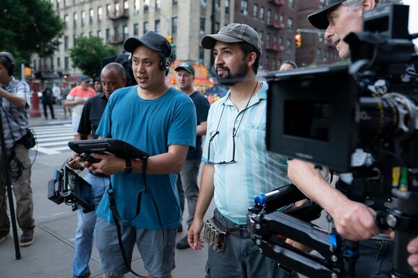 Director Jon M. Chu (left) and creator Lin-Manuel Miranda on the set of "In the Heights."