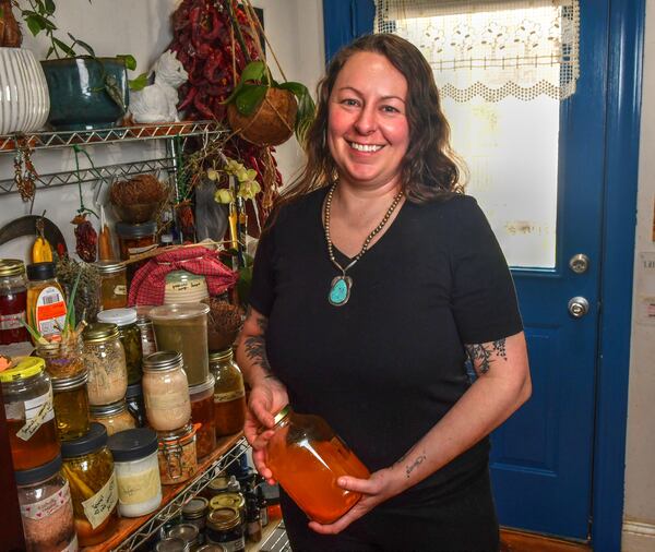 Chef/author Julia Skinner, shown in her kitchen in Atlanta, is an advocate of cooking methods that reduce food waste. (Chris Hunt for the AJC)