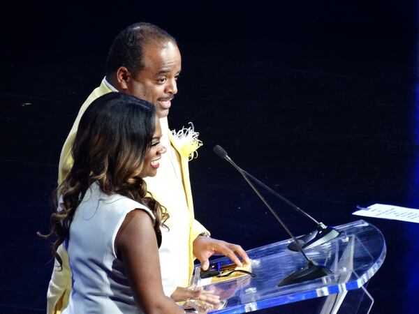 Kandi Burruss, now pregnant, joined talk show host Roland Martin to present best barber shop. CREDIT: Rodney Ho/ rho@ajc.com