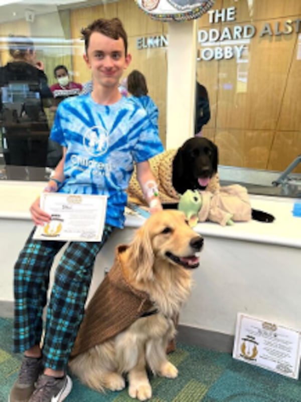 Unlike other dogs in the program, Reggie is not assigned to one specific unit at the hospital. He operates throughout the hospital and even attends special events and fundraisers. (Courtesy of Children's Healthcare of Atlanta)