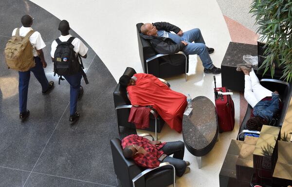 Some stranded passengers were still at Hartsfield-Jackson International Airport on Friday, April 7, 2017. HYOSUB SHIN / HSHIN@AJC.COM