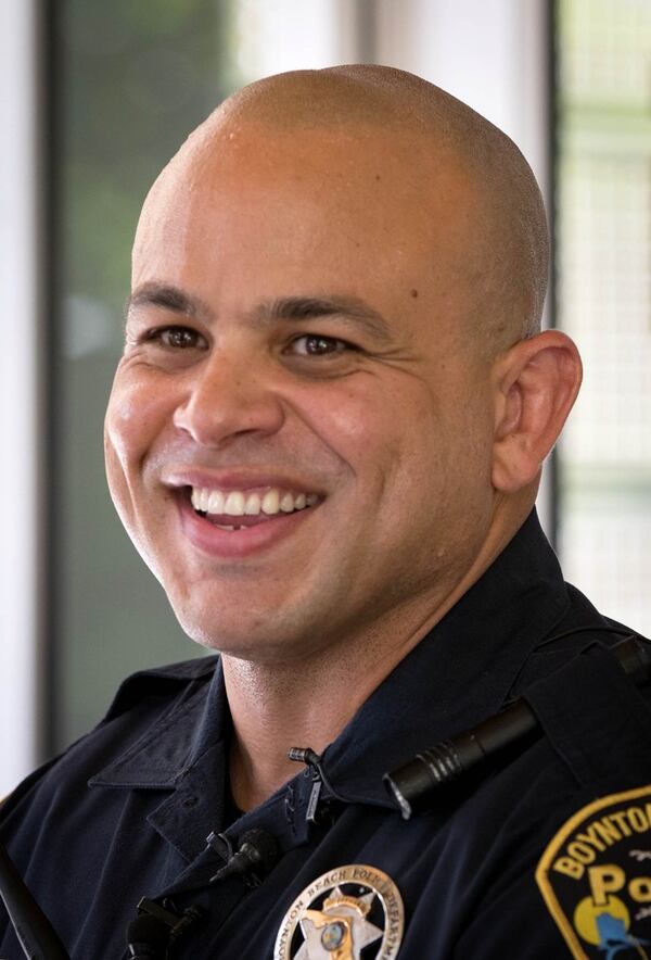 Boynton Beach Police officer Alfredo Vargas talks his encounter catching an alligator while on duty in Boynton Beach, Florida on July 26, 2017. (Photo: Allen Eyestone / The Palm Beach Post)