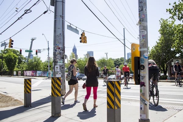 People walk the Eastside Beltline trail in Atlanta, Georgia, on Monday, April 30, 2018. (REANN HUBER/REANN.HUBER@AJC.COM)