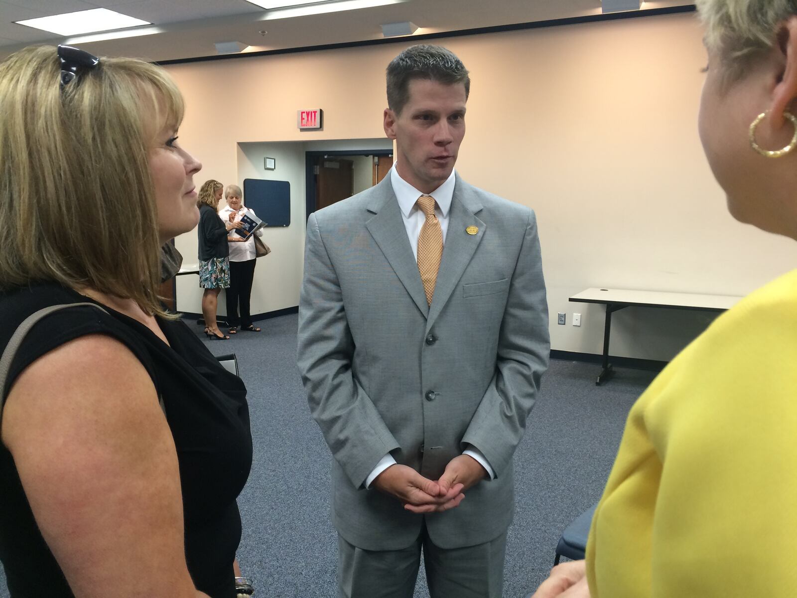 Georgia Board of Nursing Executive Director Jim Cleghorn talks to nurses after a board meeting on July 21, 2016 in Macon. Secretary of State Brian Kemp wants to replace Cleghorn with the director of the state cosmetology board, but the nursing board is resisting the move. CHRIS JOYNER/CJOYNER@AJC.COM