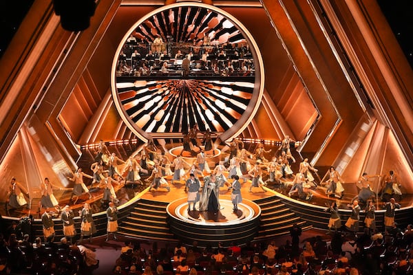 Queen Latifah, center, performs "Ease on Down the Road" during the Oscars on Sunday, March 2, 2025, at the Dolby Theatre in Los Angeles. (AP Photo/Chris Pizzello)