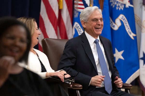 Attorney General Merrick Garland reacts during a farewell ceremony at the Department of Justice, Thursday, Jan. 16, 2025, in Washington. (AP Photo/Mark Schiefelbein)