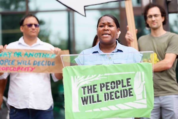 Cop City organizer Keyanna Jones Moore speaks at a press conference outside City Hall on Wednesday, Sept. 11, 2024, marking the first anniversary of the organizers’ submission of the training center petition.
(Miguel Martinez / AJC)