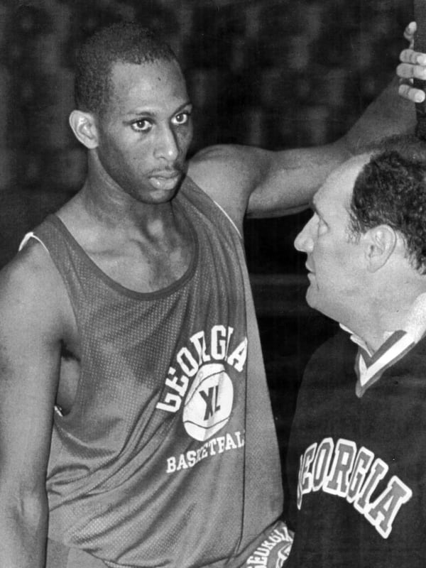 James Banks and coach Hugh Durham talk during a practice heading into the 1983 Final Four matchup against N.C. State.  (AJC file photo/Wingate Downs)