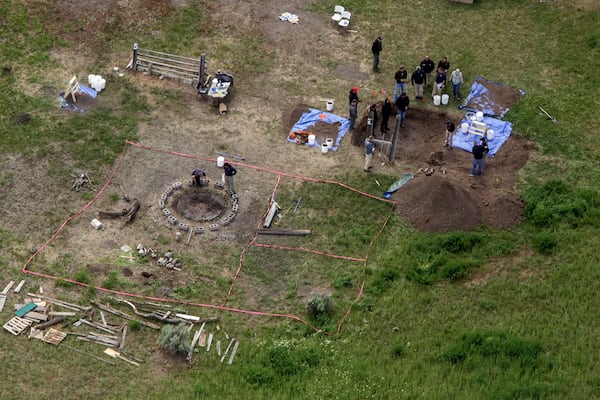 In this aerial photo, investigators search for human remains at Chad Daybell's residence in the 200 block of 1900 east, on Tuesday in Salem, Idaho. 